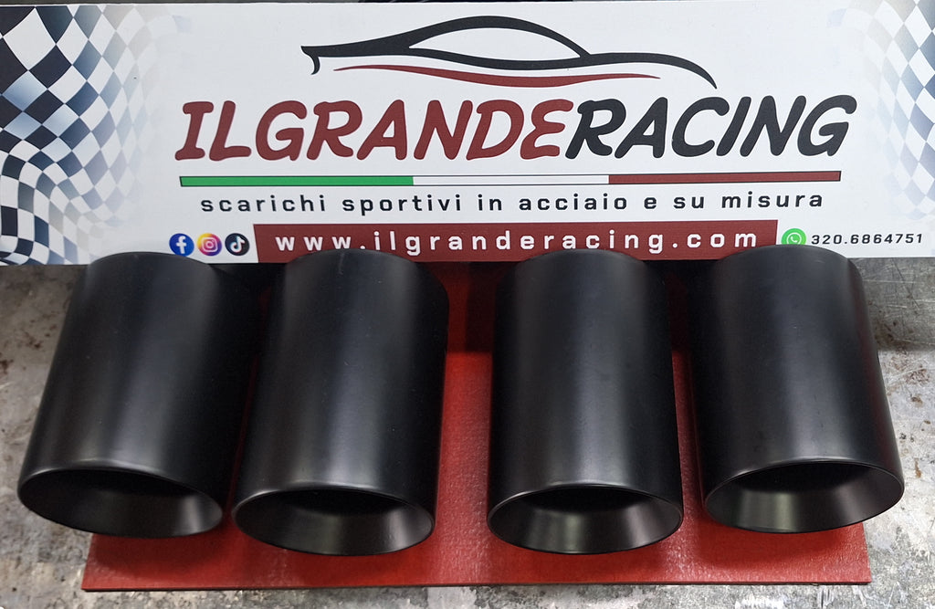 Terminali doppi in acciao verniciati neri dx e sx con ingresso diam.63 out 90 . Uscita dritta.